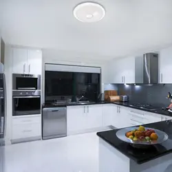 Kitchen With Black Appliances Photo