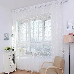 Fashionable tulle in the bedroom photo