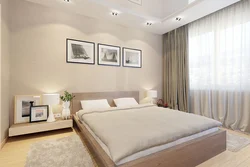Interior of a small beige bedroom