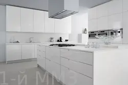 White Kitchen With White Handles Photo