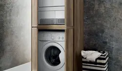 Dryer on washing machine in bathroom photo