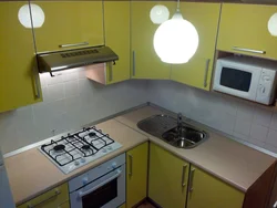 Corner Kitchens With A Sink In The Corner And A Refrigerator Photo