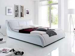 See photos of beds in the bedroom