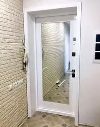 White entrance door to the apartment photo