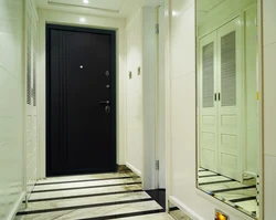 White entrance door to the apartment photo