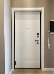 White entrance door to the apartment photo