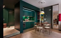 Apartment design with green kitchen