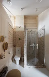 Bathrooms in a wooden house design photo with shower