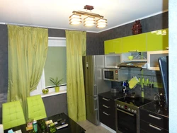 Green wallpaper and curtains in the kitchen photo