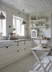 Interior of a wooden kitchen in white