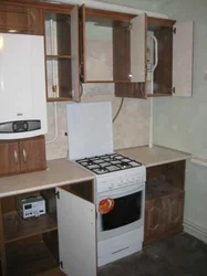 Kitchen design with gas boiler and pipes photo
