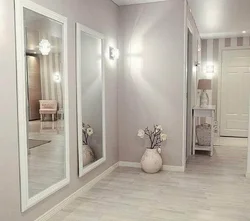 White hallway with mirror design