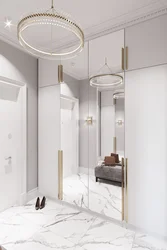 White hallway with mirror design