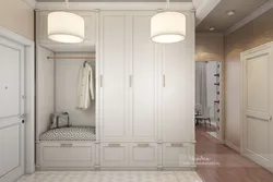 White hallway with mirror design