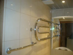 Bathroom design with heated towel rail