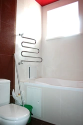 Bathroom design with heated towel rail