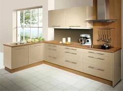 Photo of a kitchen with beige cabinets