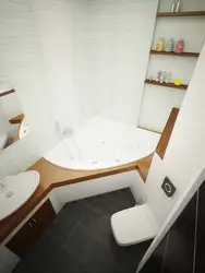 Kiçik vanna otağında künc küveti və lavabo ilə vanna dizaynı