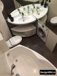 Bath design with corner bathtub and sink in small bathroom