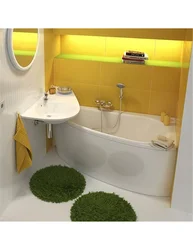 Bath design with corner bathtub and sink in small bathroom