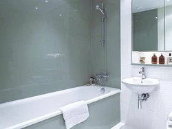 Bathroom trimmed with plastic panels photo design