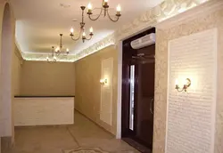 Hallway made of decorative plaster, photo of flowers