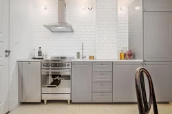 Photo of a kitchen without wall cabinets