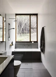 Design of a bathroom with a window in the house