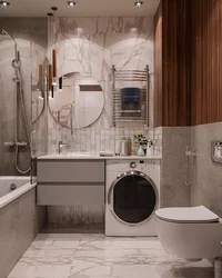 Design of a combined bathroom with bathtub and washing machine photo