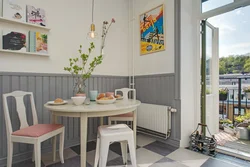 Wall design near the table in the kitchen photo