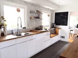 White kitchen with wooden countertop photo