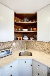 Corner sink in the kitchen in the interior