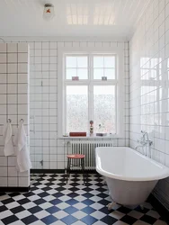 Bathroom In White Tiles Photo