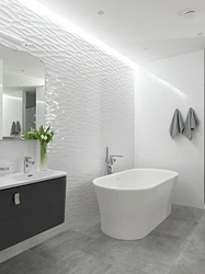 Bathroom in white tiles photo