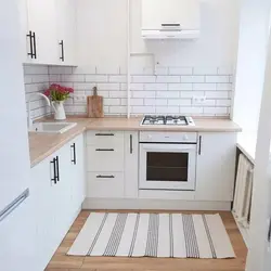 Small white kitchen design photo