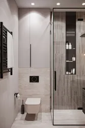 Bathroom design with shower on the wall