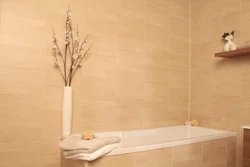 Bathtub covered with PVC panels photo