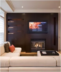 Photo Of A Living Room With A Fireplace And TV In An Apartment