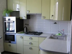 Kitchen design 5 square meters with refrigerator and gas stove