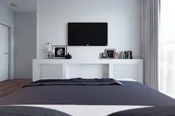 Телевизор в интерьере спальни фото