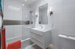 Photo of a bathroom in gray and white