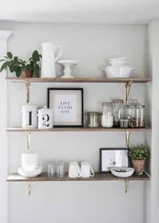 Wall shelves in the kitchen interior photo