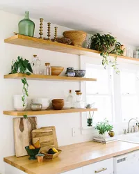 Wall shelves in the kitchen interior photo