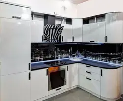 White glossy kitchen with black countertop photo