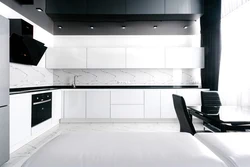 White glossy kitchen with black countertop photo