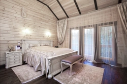 Bedroom in a house made of timber photo