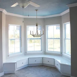 Kitchen in the bay window at home design photo