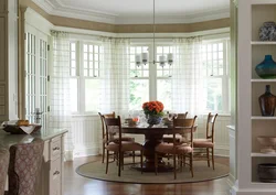 Kitchen in the bay window at home design photo