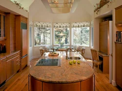 Kitchen in the bay window at home design photo