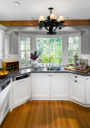 Kitchen in the bay window at home design photo